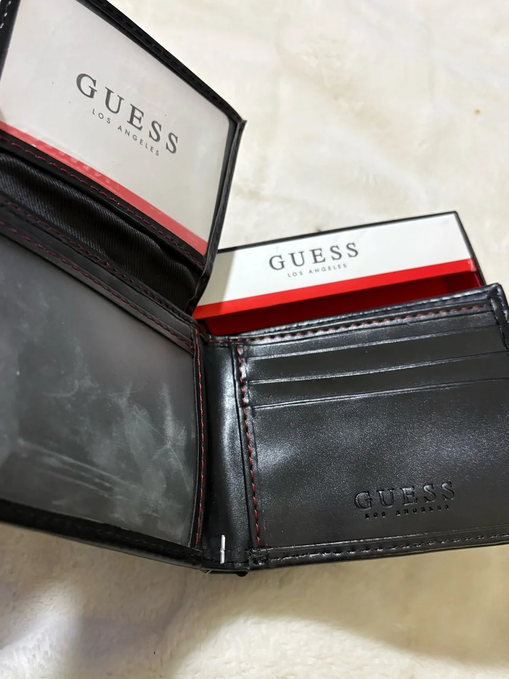 GUESS Black Leather Men's Wallet with Red Stitch Accents
